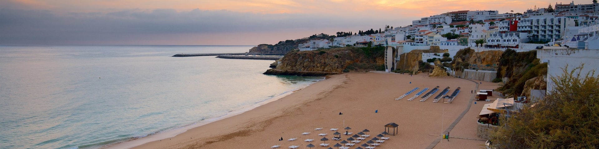 Fisherman\'s Beach featuring a sunset, a coastal town and a sandy beach
