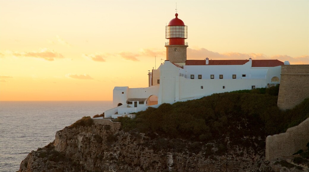 Cape St. Vincent Lighthouse showing general coastal views, a lighthouse and a sunset