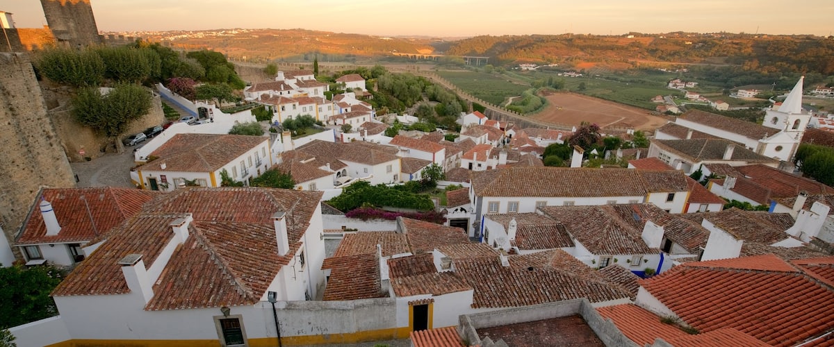 Obidos featuring a sunset, landscape views and tranquil scenes