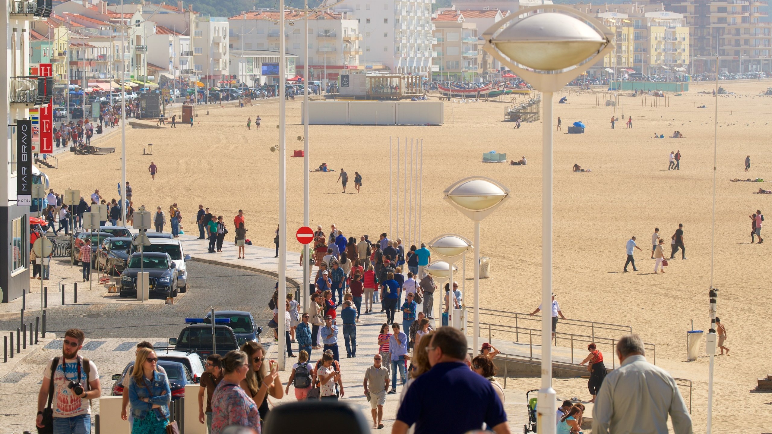 Nazare featuring general coastal views, a sandy beach and a city