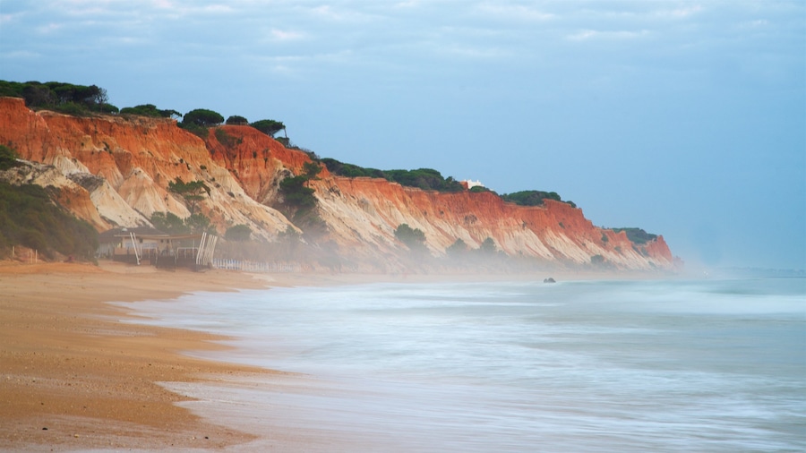 Falesia Beach featuring a beach, rocky coastline and general coastal views