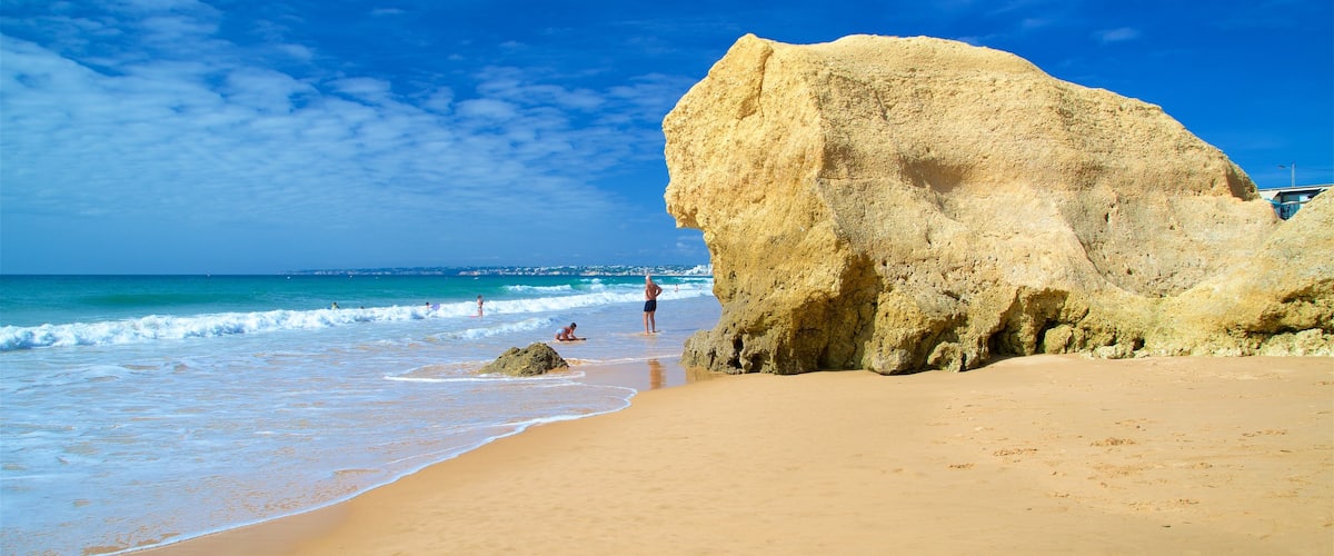 Gale Beach which includes general coastal views, a beach and rocky coastline