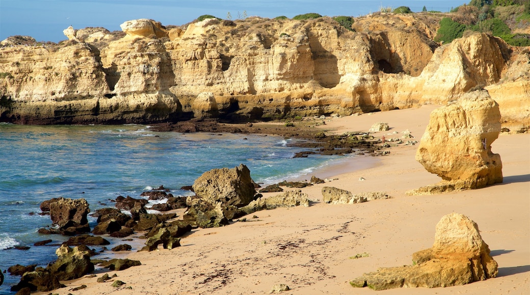 Sao Rafael Beach which includes rugged coastline, a sandy beach and general coastal views