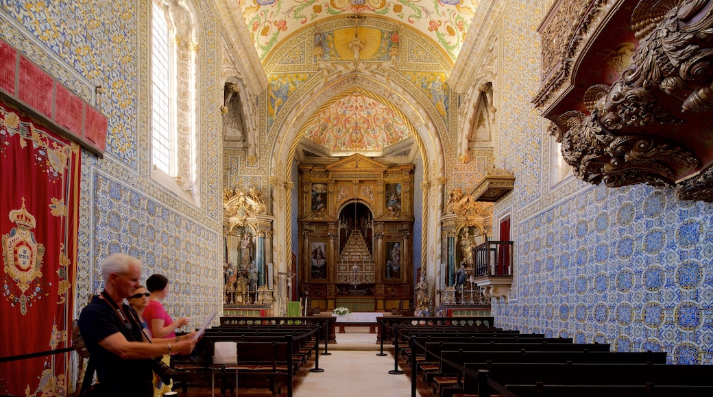 Coimbra University featuring interior views, a church or cathedral and heritage elements