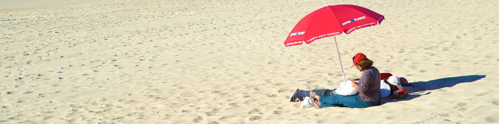 Costa Nova Beach featuring a beach and general coastal views as well as a couple