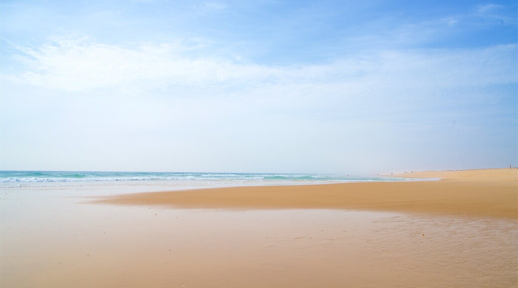 Fuzeta Beach which includes general coastal views and a sandy beach