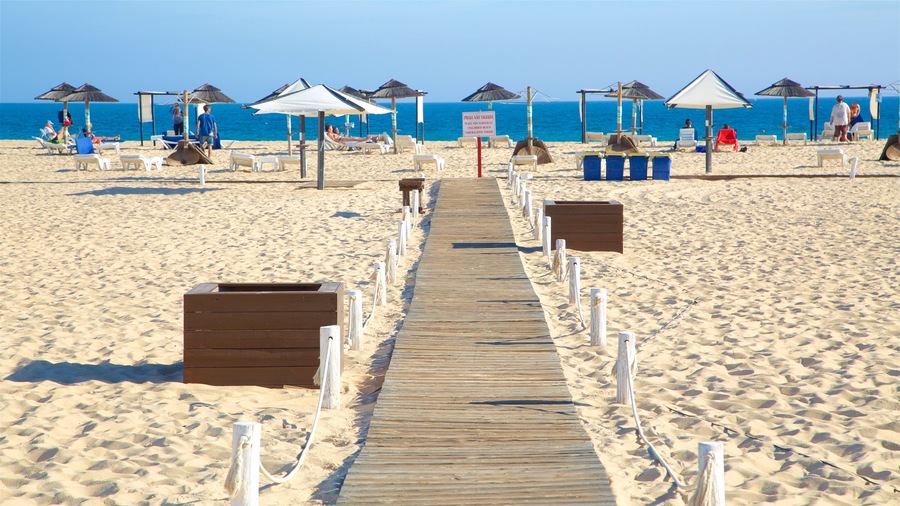 Ilha de Tavira Beach featuring a beach and general coastal views