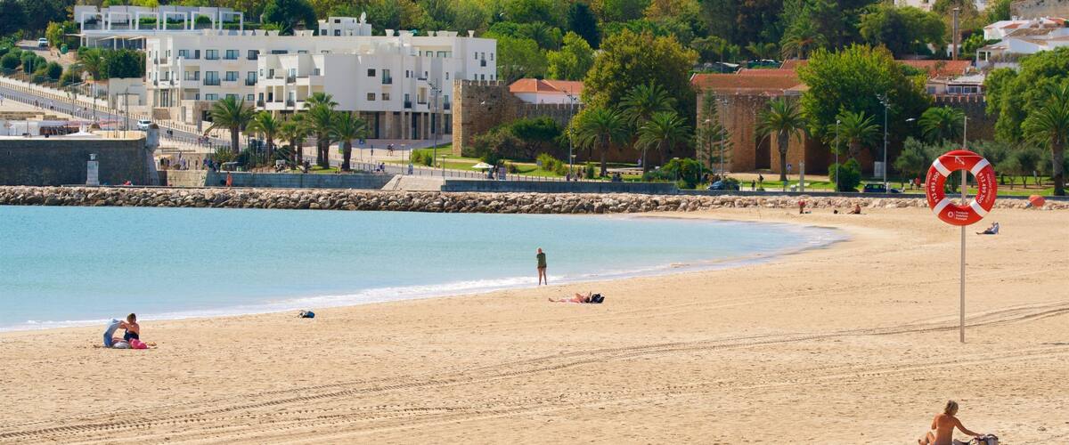 Meia Praia Beach featuring a coastal town, general coastal views and a sandy beach