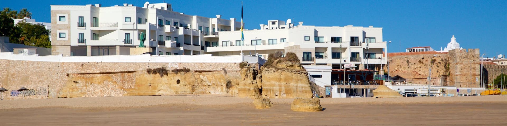Batata Beach featuring general coastal views, a coastal town and a beach