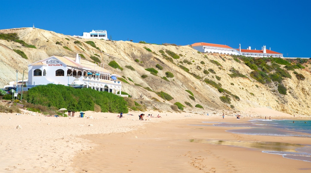 Playa de Mareta que incluye una playa de arena y vistas de una costa