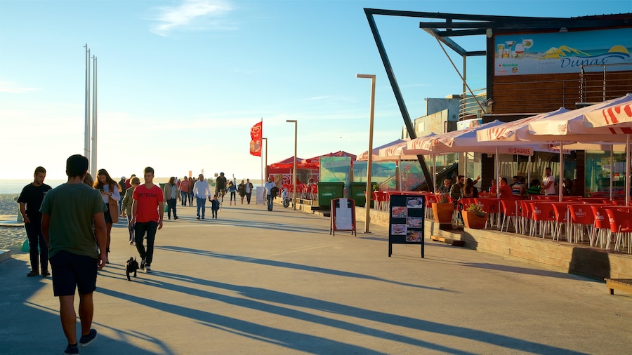 Barra Beach as well as a small group of people