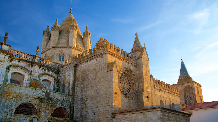Evora Cathedral featuring a sunset, heritage architecture and a church or cathedral