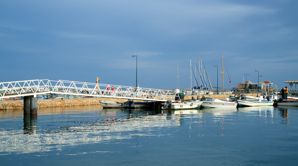 Olhao Harbour featuring a bay or harbor