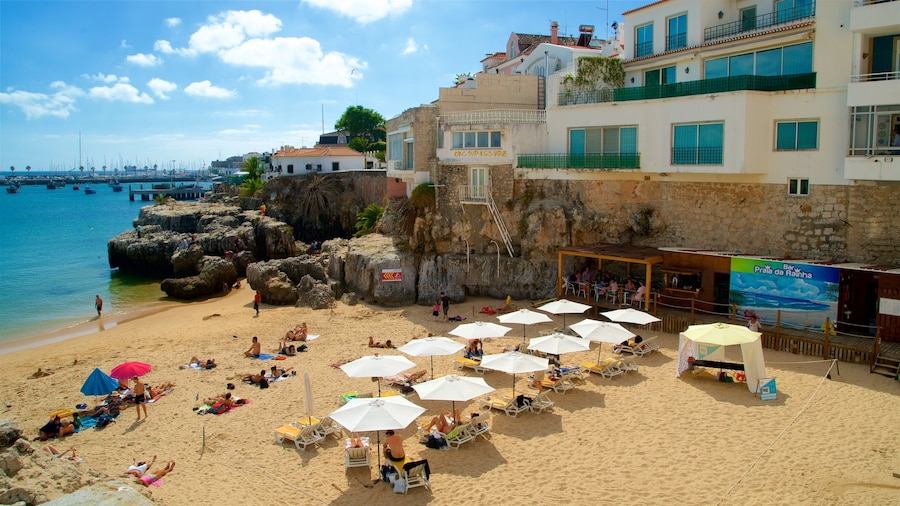 Rainha Beach showing a coastal town, a beach and general coastal views