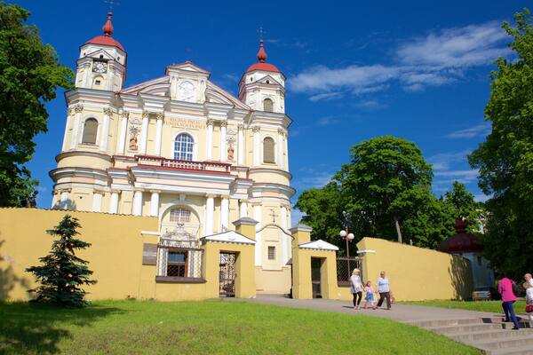 St. Peter and St. Paul\'s Church featuring a church or cathedral and heritage architecture as well as a small group of people