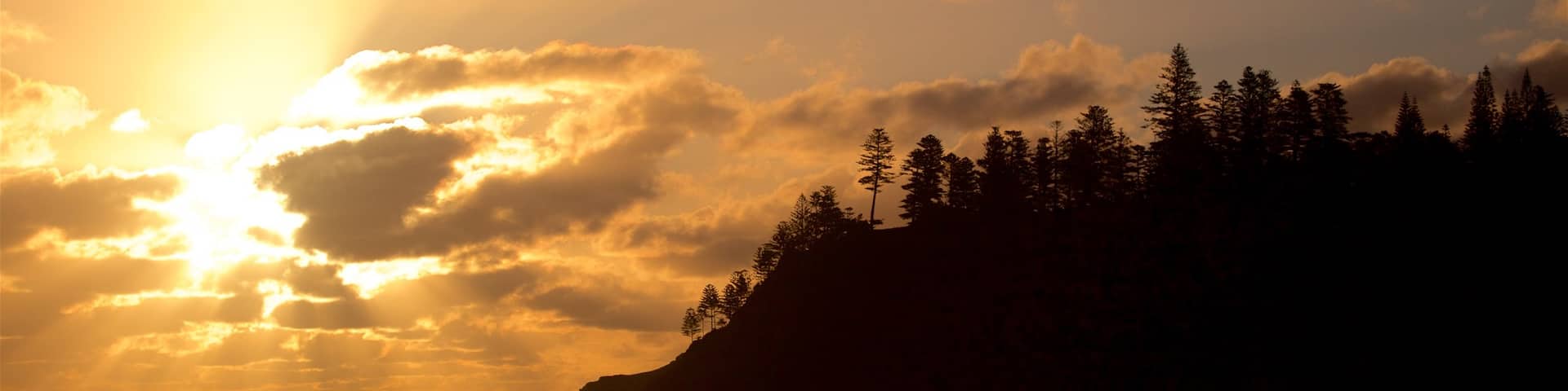 Norfolk Island showing general coastal views and a sunset