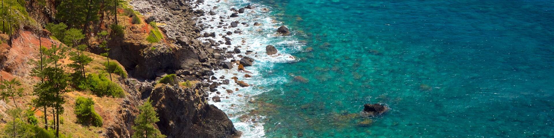 Anson Bay Beach featuring rugged coastline and general coastal views