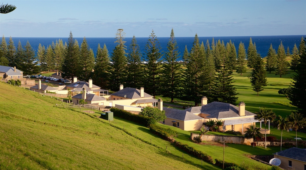 Norfolk Island which includes general coastal views and a small town or village