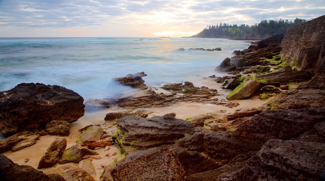 Norfolk Island featuring rugged coastline, general coastal views and a sunset