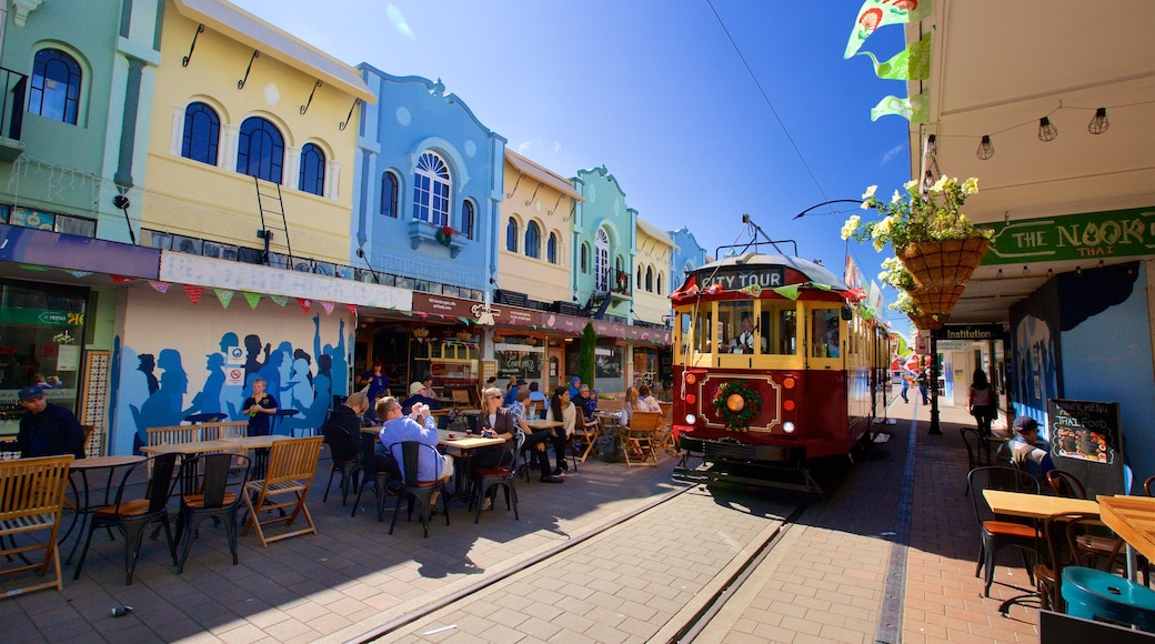 New Regent Street showing railway items and outdoor eating as well as a small group of people