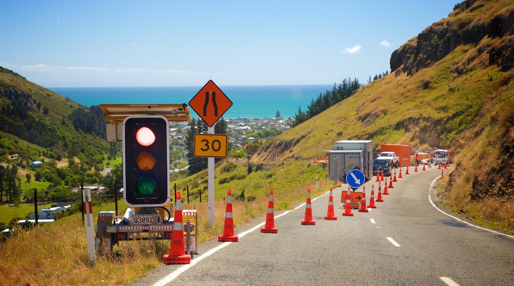 Mount Cavendish which includes signage, general coastal views and tranquil scenes