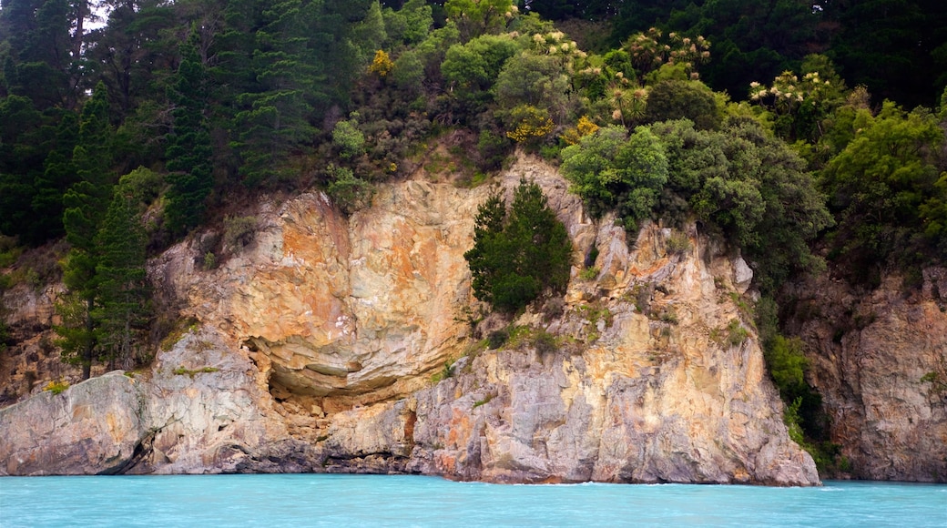 Rakaia Gorge featuring tranquil scenes and a lake or waterhole