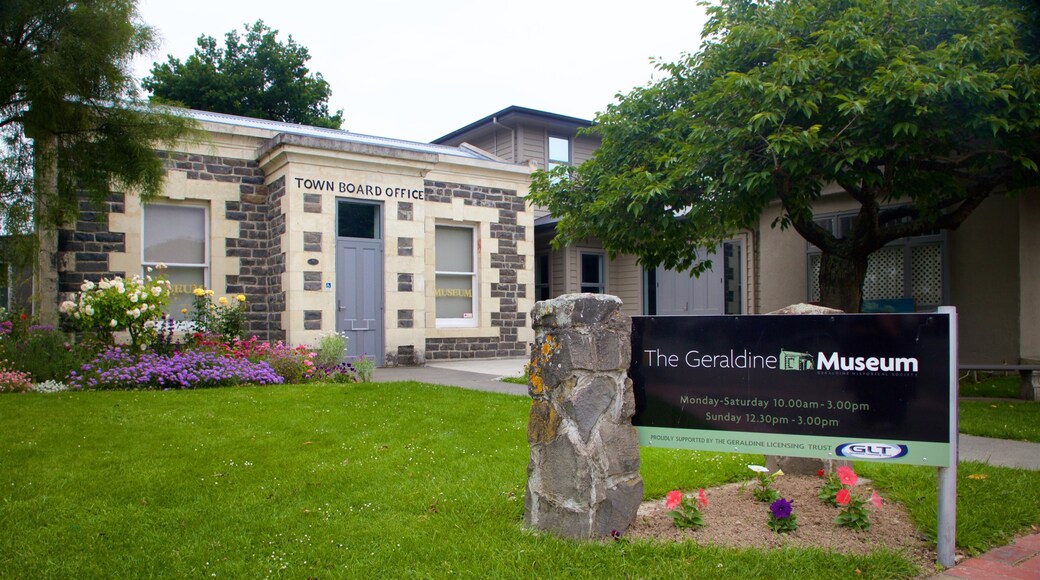 Geraldine featuring signage, a park and flowers