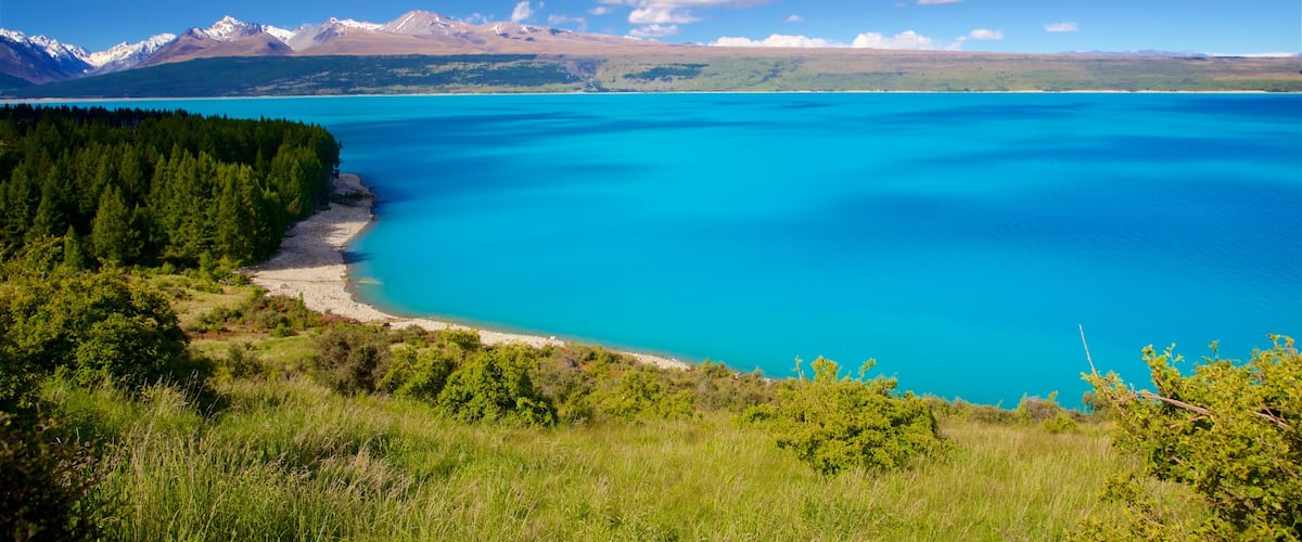 Lake Pukaki featuring tranquil scenes and a lake or waterhole