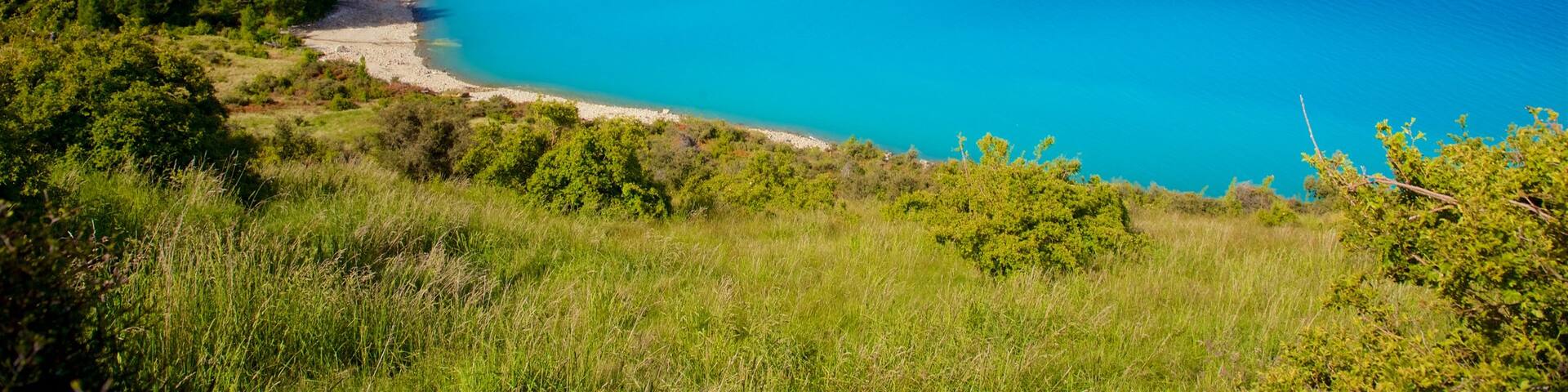 Lake Pukaki featuring tranquil scenes and a lake or waterhole
