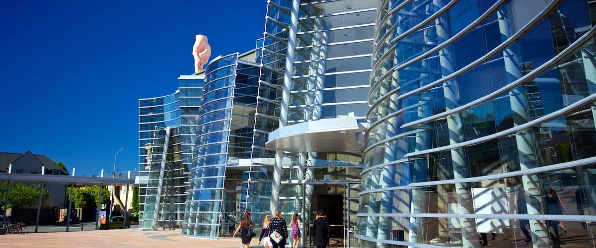 Christchurch Art Gallery featuring modern architecture as well as a small group of people