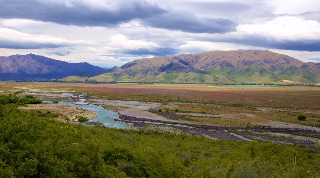 Clay Cliffs which includes mountains, landscape views and a river or creek