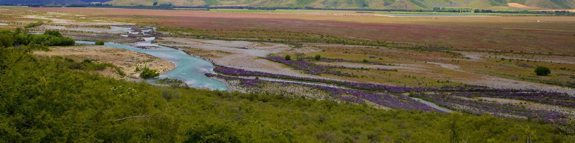 Clay Cliffs featuring mountains, landscape views and a river or creek