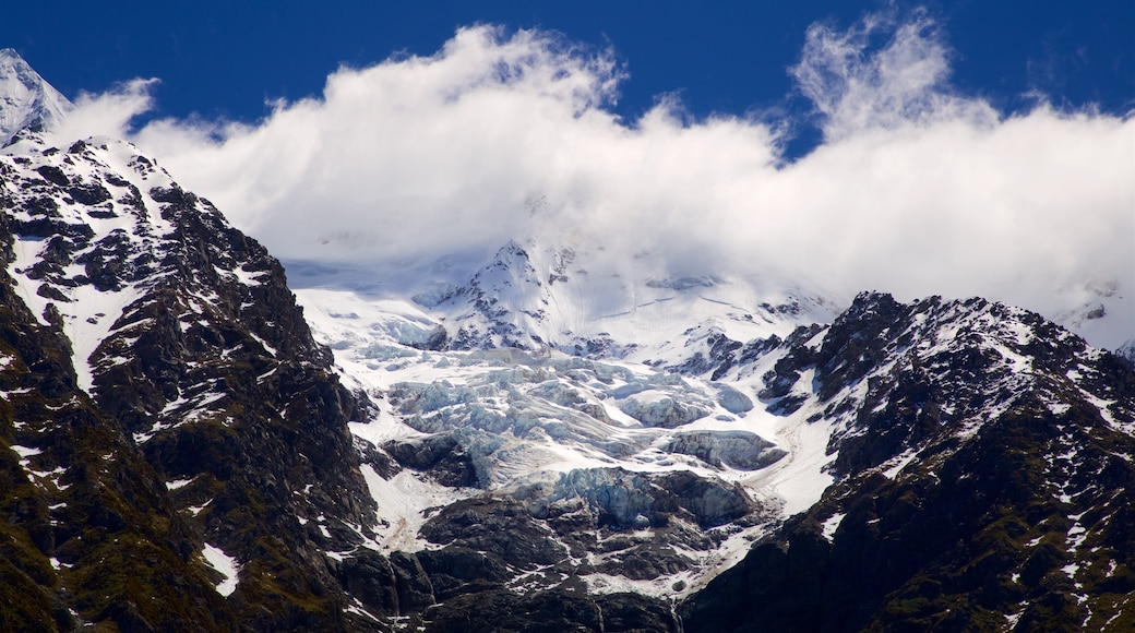 Mount Cook National Park showing mist or fog, mountains and snow