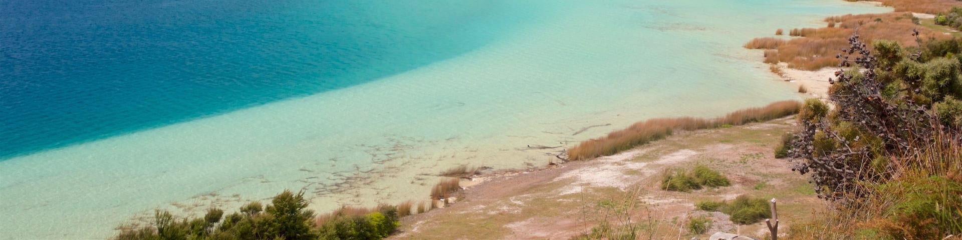 Kai Iwi Lakes featuring a lake or waterhole and tranquil scenes