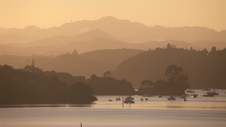 Paihia showing a bay or harbor, a sunset and tranquil scenes