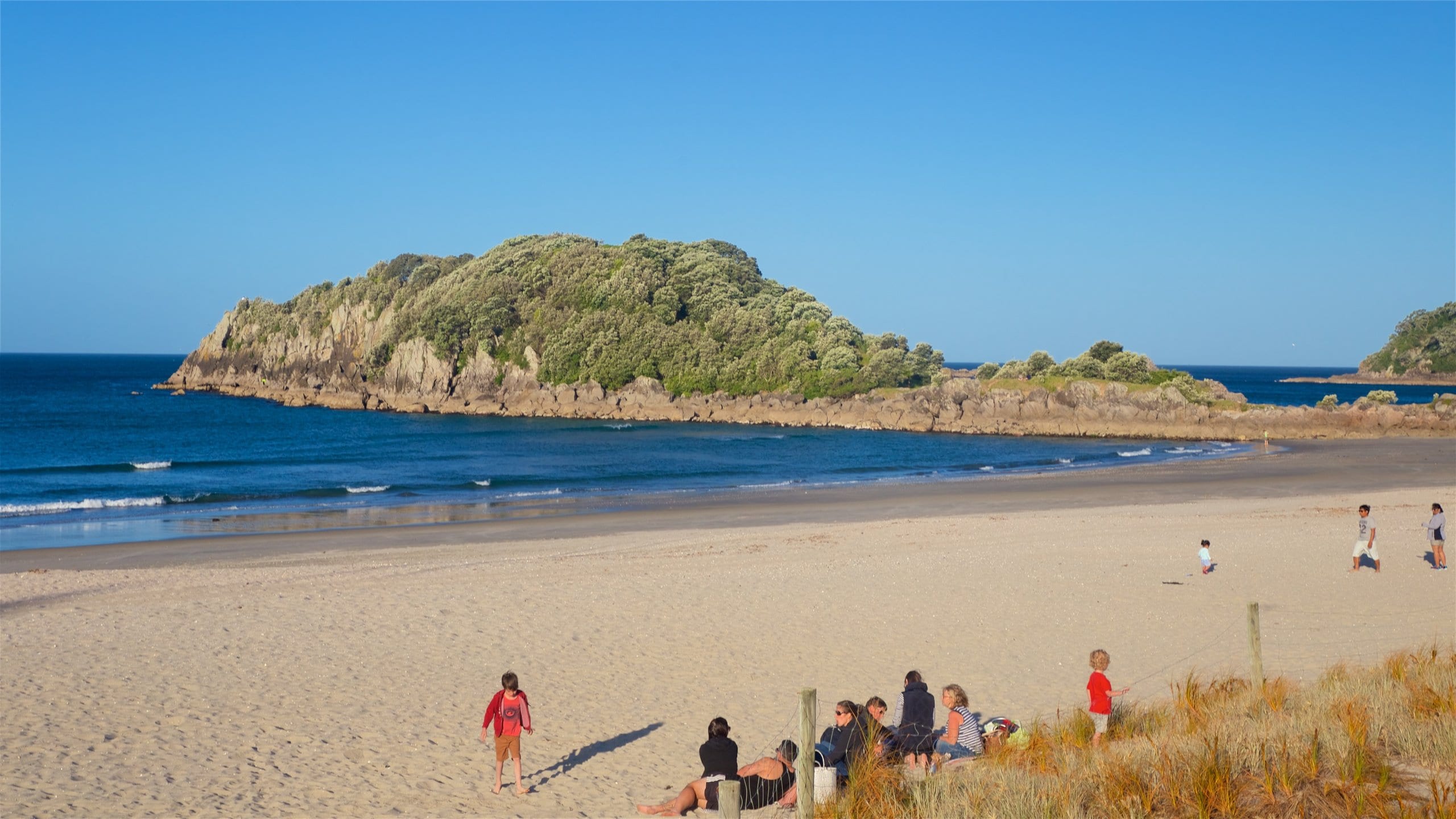 Mount Maunganui which includes a beach, rugged coastline and general coastal views