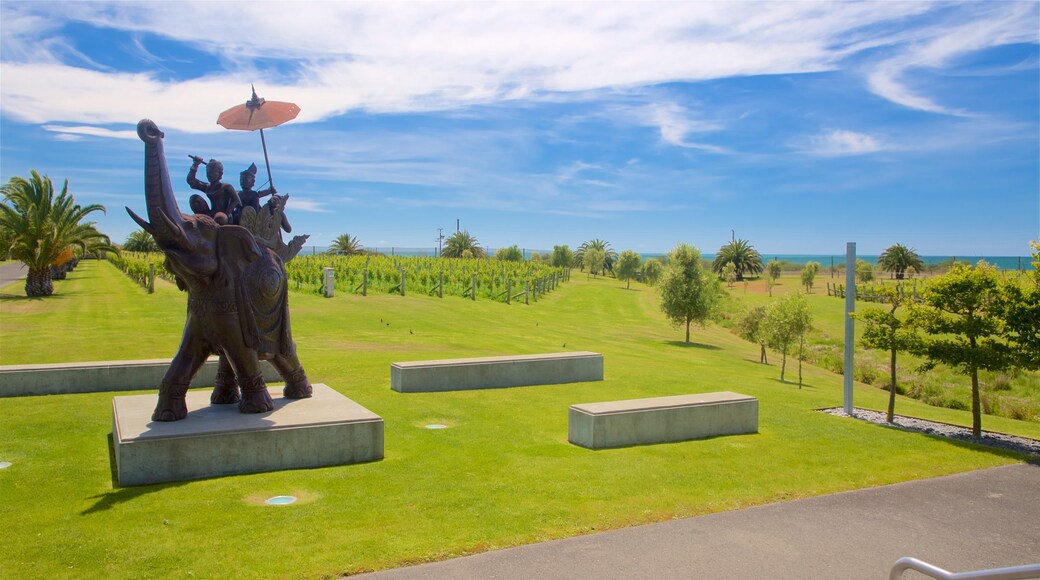 Elephant Hill Estate Winery featuring farmland, a garden and outdoor art