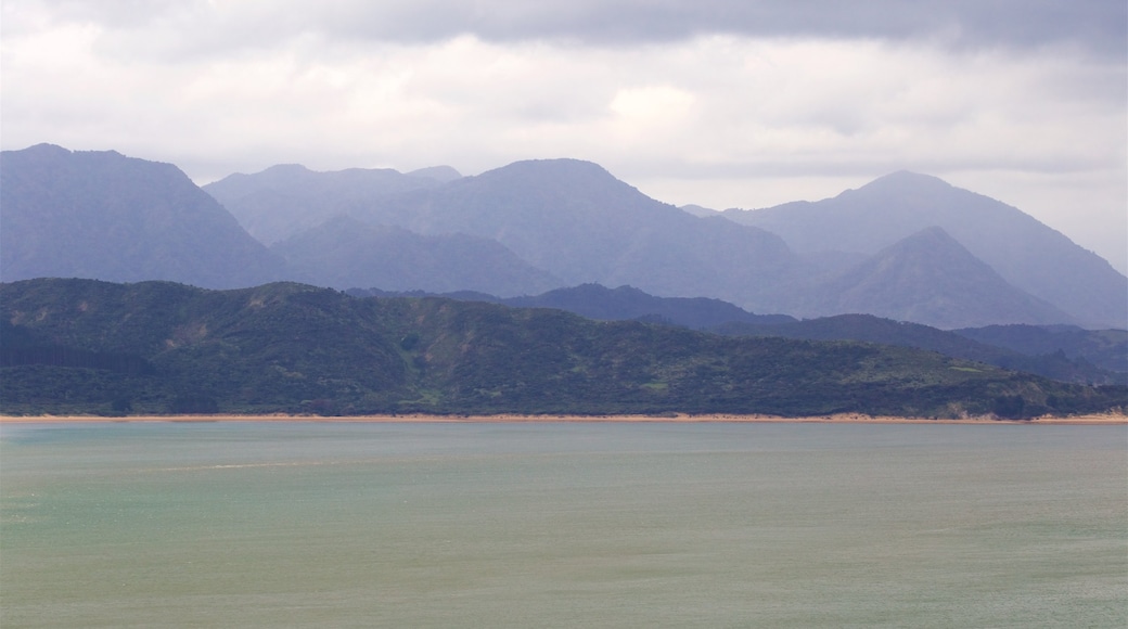 Omapere which includes tranquil scenes and a bay or harbor