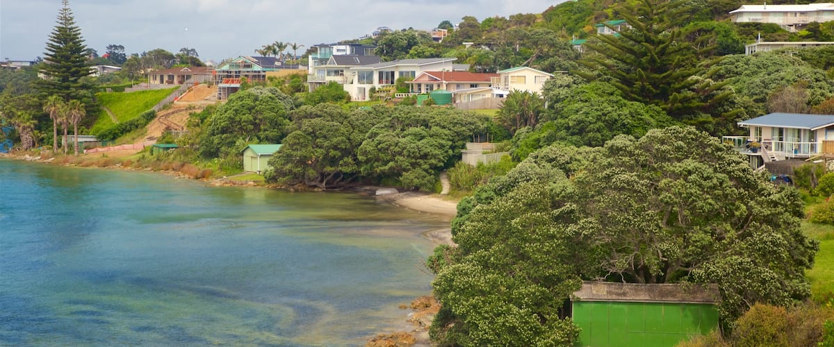 Mangawhai Heads which includes a small town or village and a river or creek