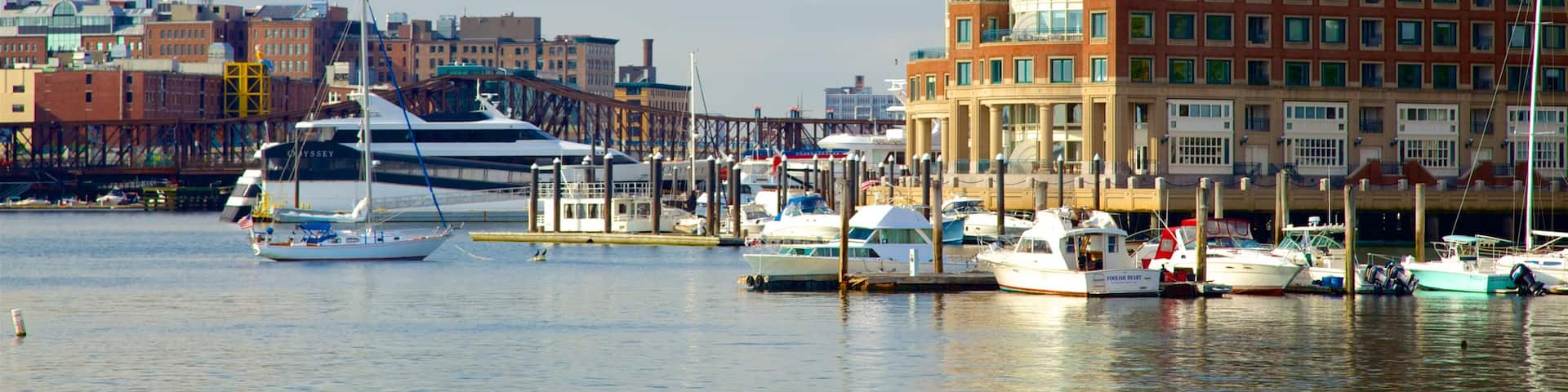 HarborWalk showing a bay or harbor and a city