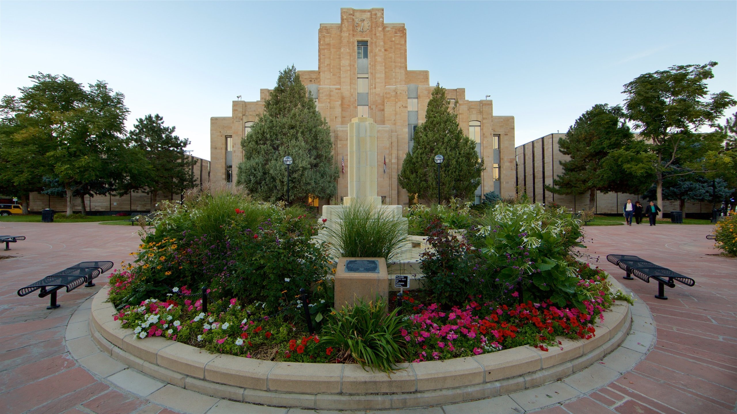 Boulder which includes wildflowers and a square or plaza