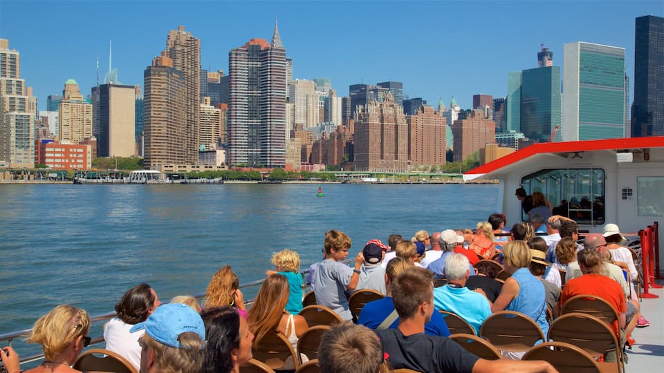 Midtown showing a city, boating and a bay or harbour