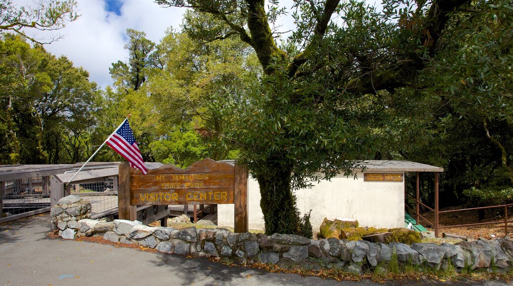 Muir Beach featuring signage and a park