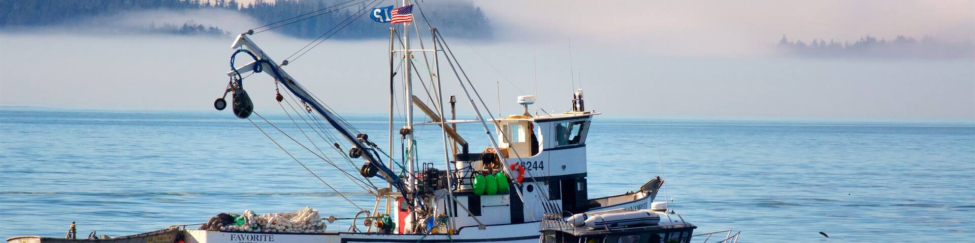 Juneau showing a bay or harbour and boating