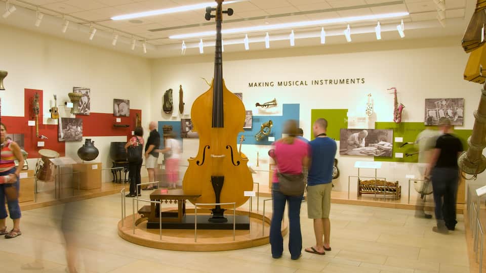 Visitors explore exhibits on musical instrument creation at the Musical Instrument Museum in Phoenix Arizona