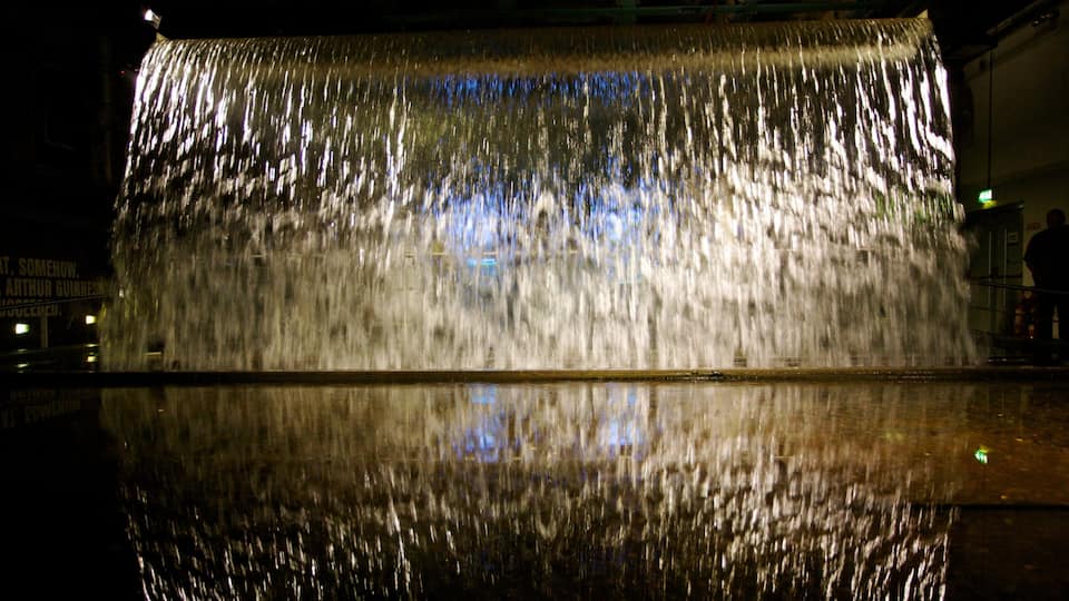 Guinness Storehouse showing night scenes, a fountain and a lake or waterhole