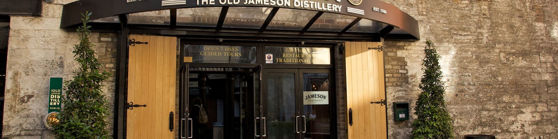 Old Jameson Distillery which includes signage and a bar