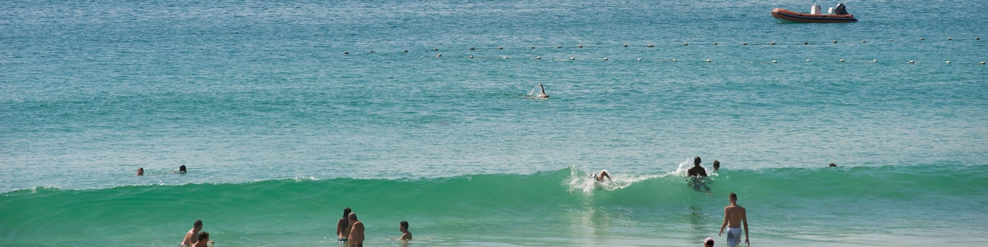 Nai Harn Beach which includes swimming, a marina and a beach