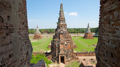 Ayutthaya which includes a temple or place of worship and heritage architecture