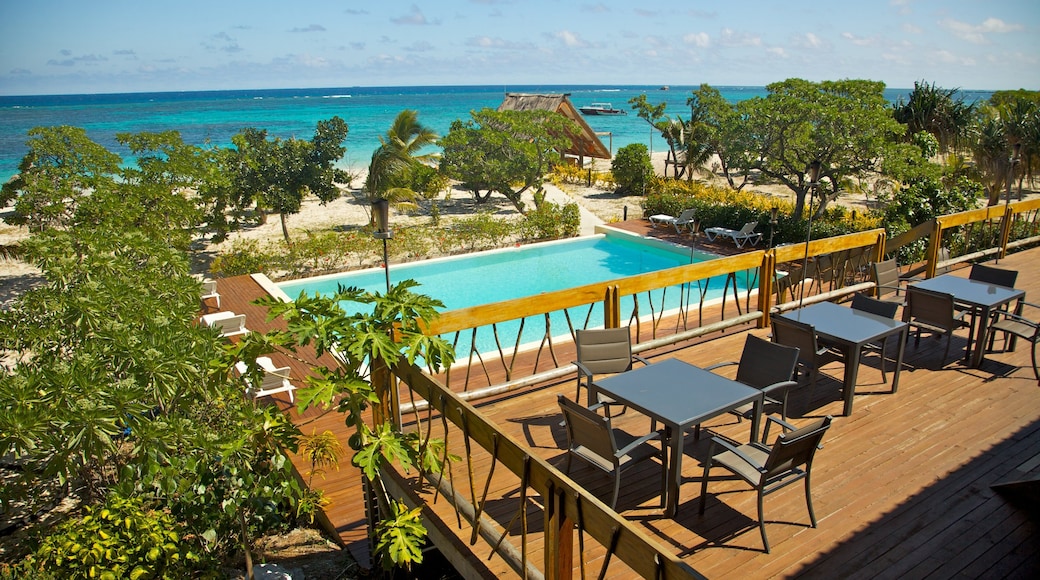 Viwa Island which includes tropical scenes, a pool and general coastal views